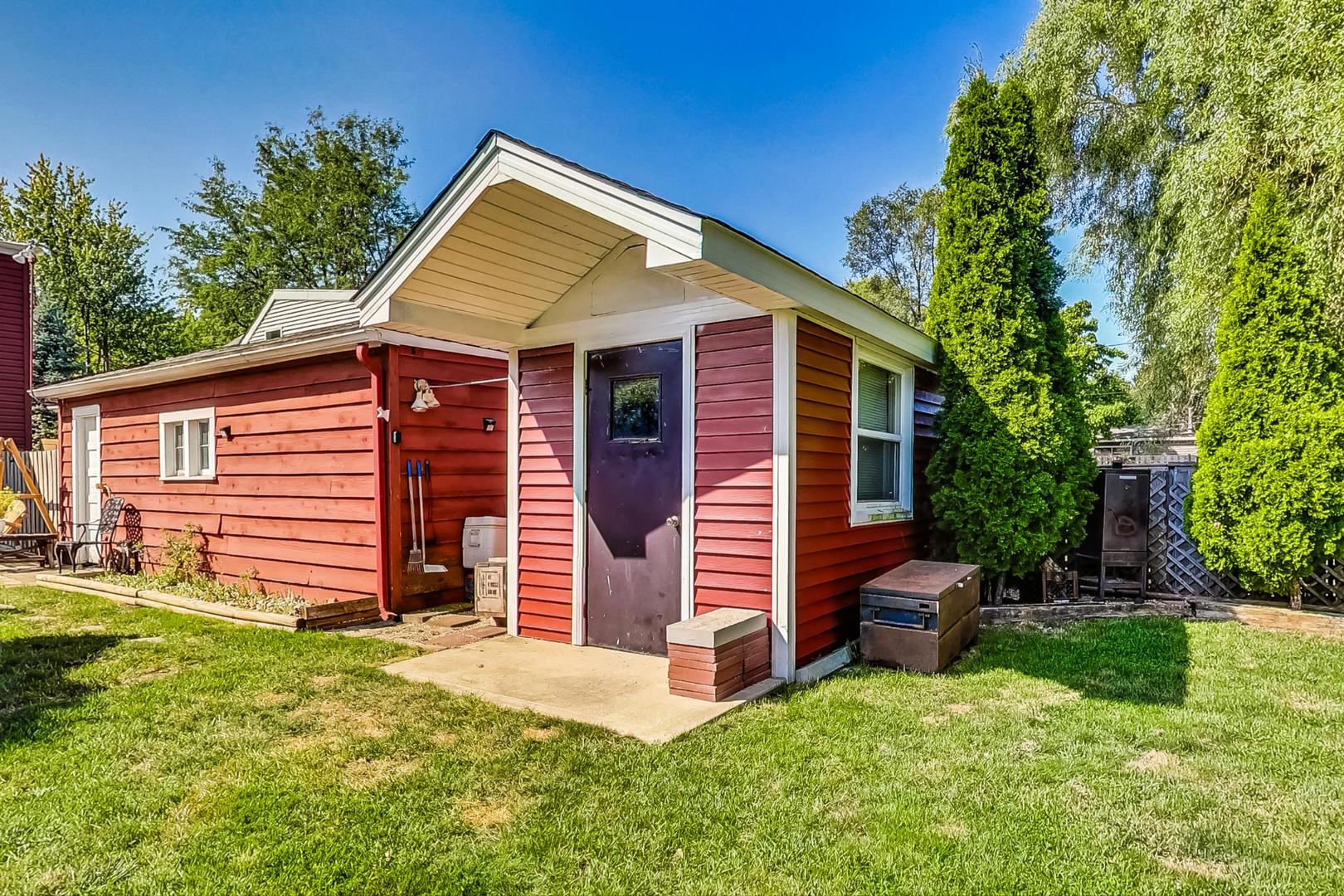 1738 Morse Avenue Des Plaines, IL 60018 - Photo 25 of 31 a front view of a house with a yard