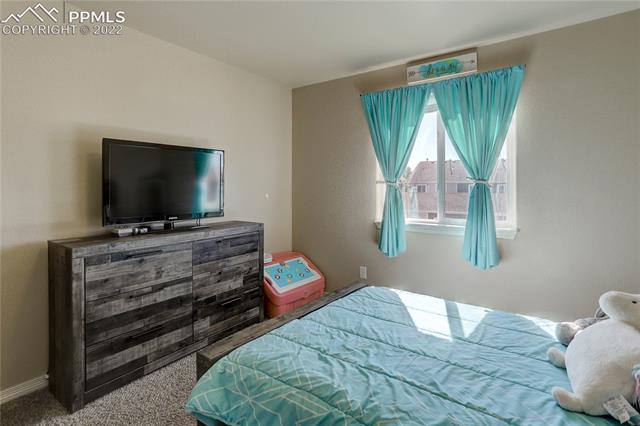 6311 Pilgrimage Road Colorado Springs, CO 80925 - Photo 24 of 24 4th upper bedroom