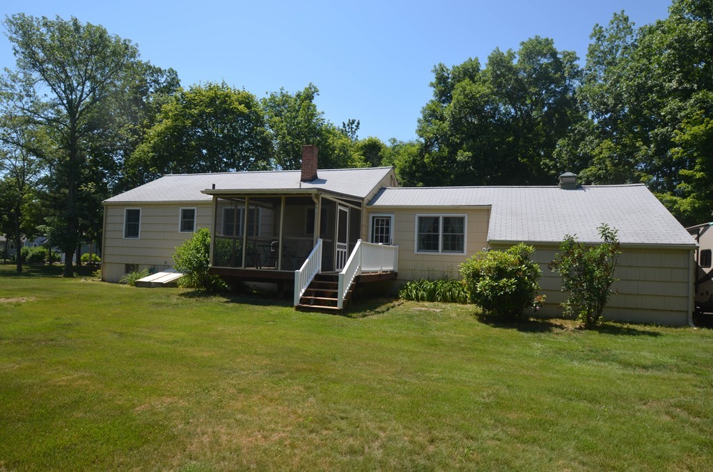 18 Baldpate Road Georgetown, MA 01833 - Photo 2 of 19 a view of a house with a yard and sitting area