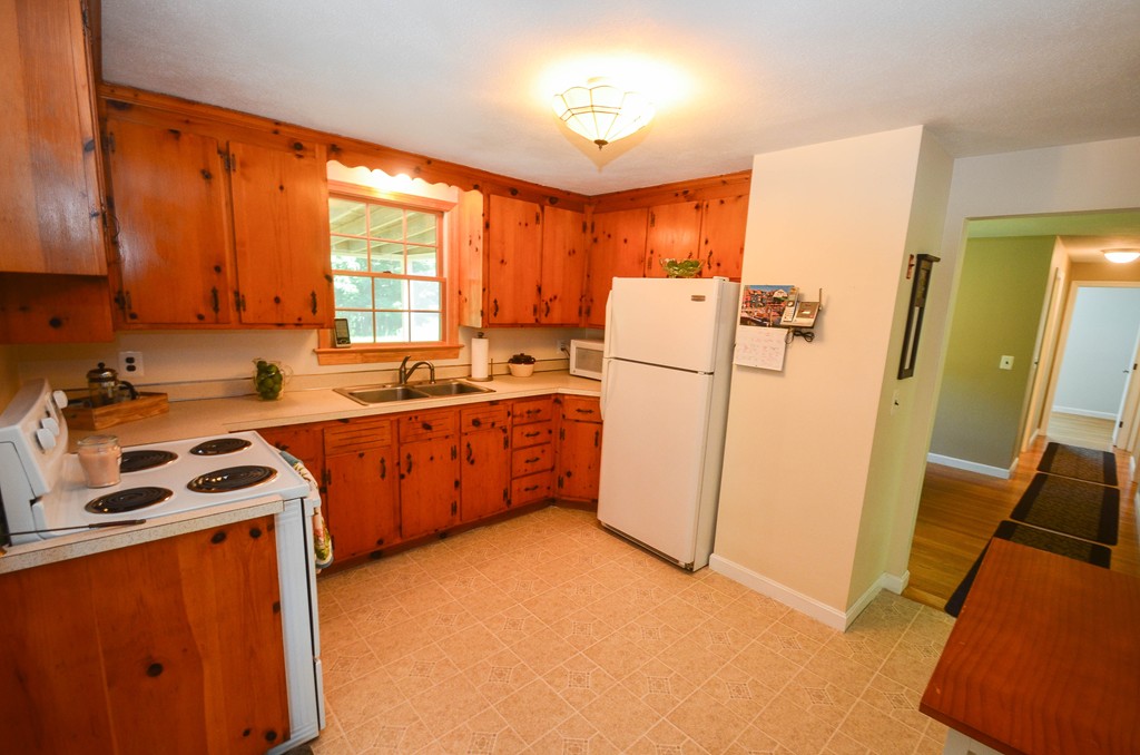 18 Baldpate Road Georgetown, MA 01833 - Photo 9 of 19 a view of a kitchen with sink and refrigerator