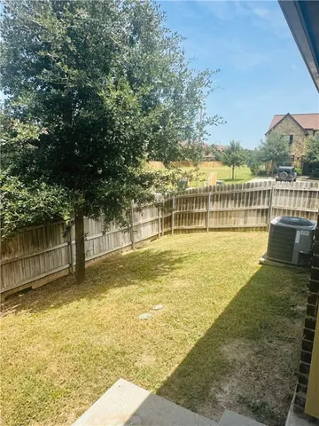 a view of a swimming pool with an outdoor space
