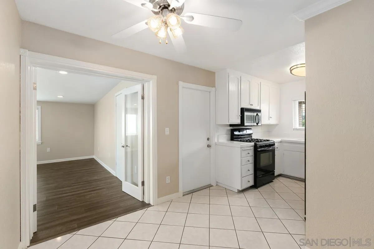 10025 Pinewood View Santee, CA 92071 - Photo 11 of 29 a kitchen with stainless steel appliances a refrigerator and a stove top oven