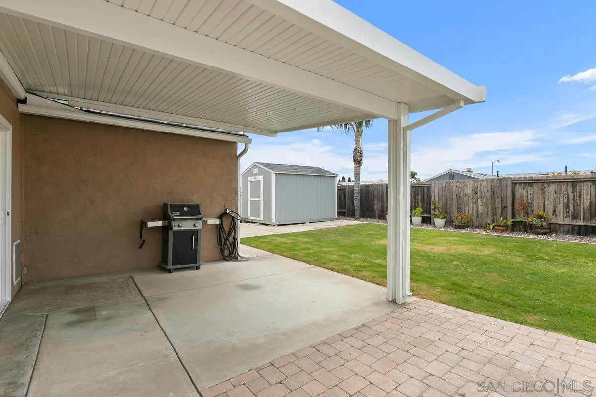 10025 Pinewood View Santee, CA 92071 - Photo 20 of 29 a view of a house with backyard and porch