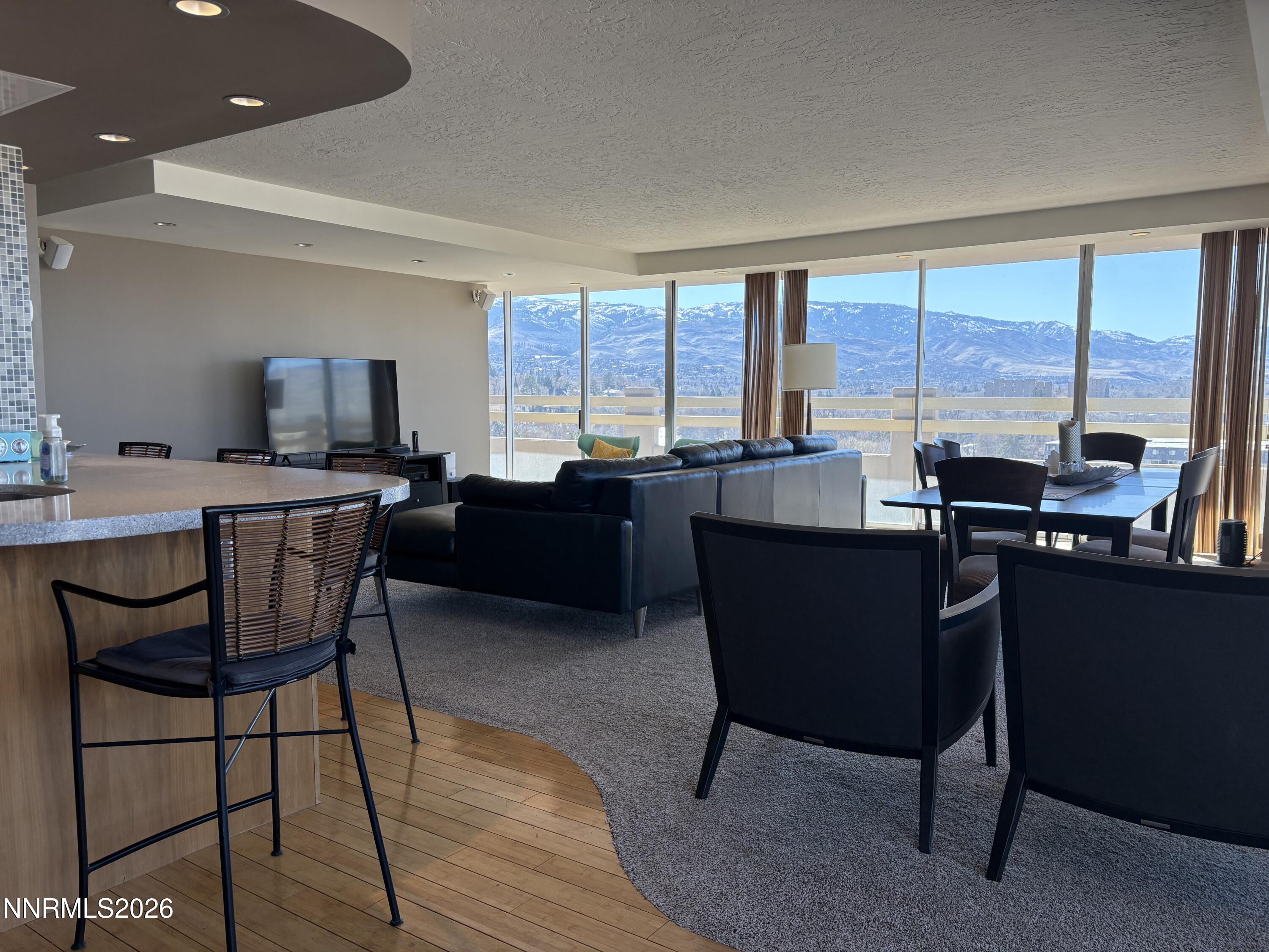 100 North Arlington Avenue, Unit 8J Reno, NV 89501 - Photo 3 of 17 3 Front rom west