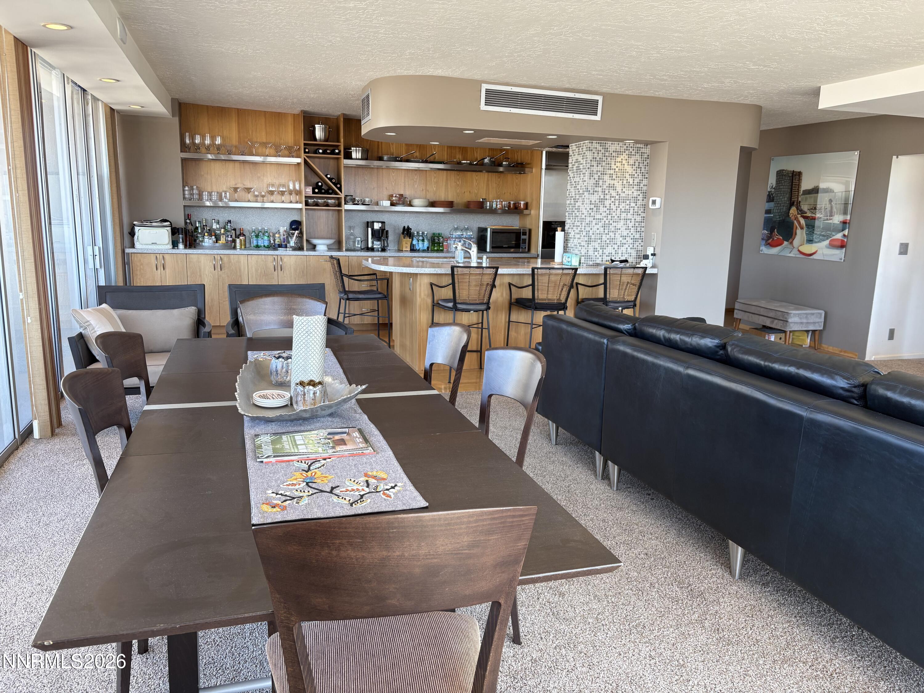 100 North Arlington Avenue, Unit 8J Reno, NV 89501 - Photo 7 of 17 7 frnt rom kitch