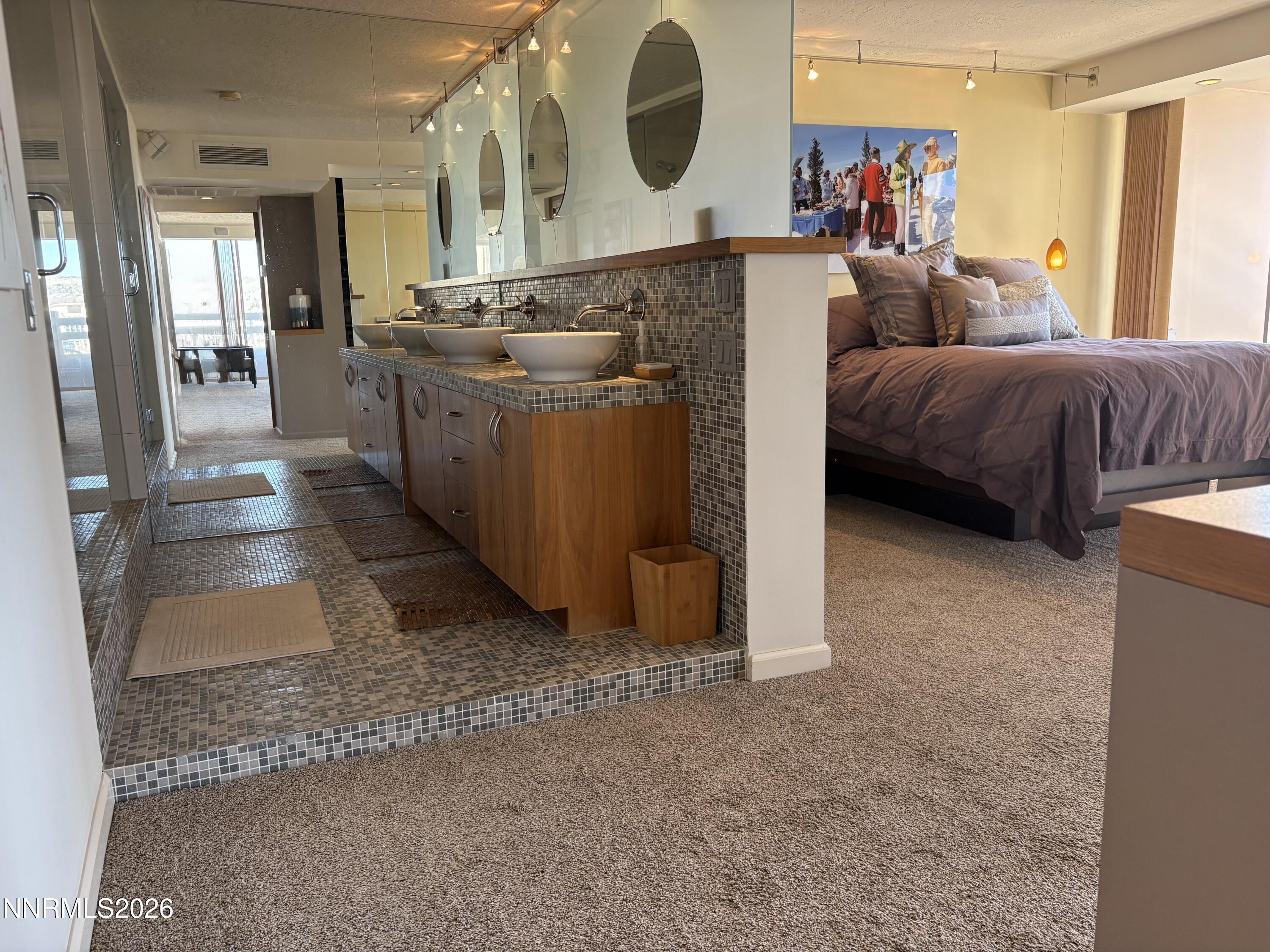 100 North Arlington Avenue, Unit 8J Reno, NV 89501 - Photo 9 of 17 9 Primary bath