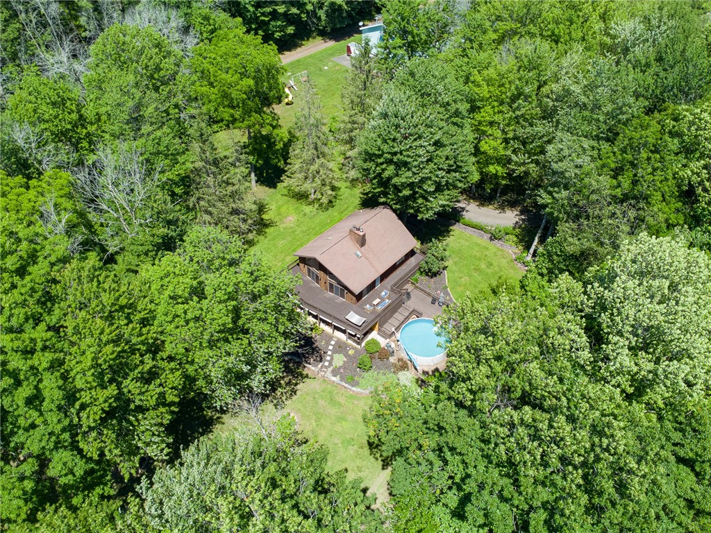 7733 East Port Bay Road Wolcott, NY 14590 - Photo 3 of 49 This exquisite home is tucked away on over 3 acres!