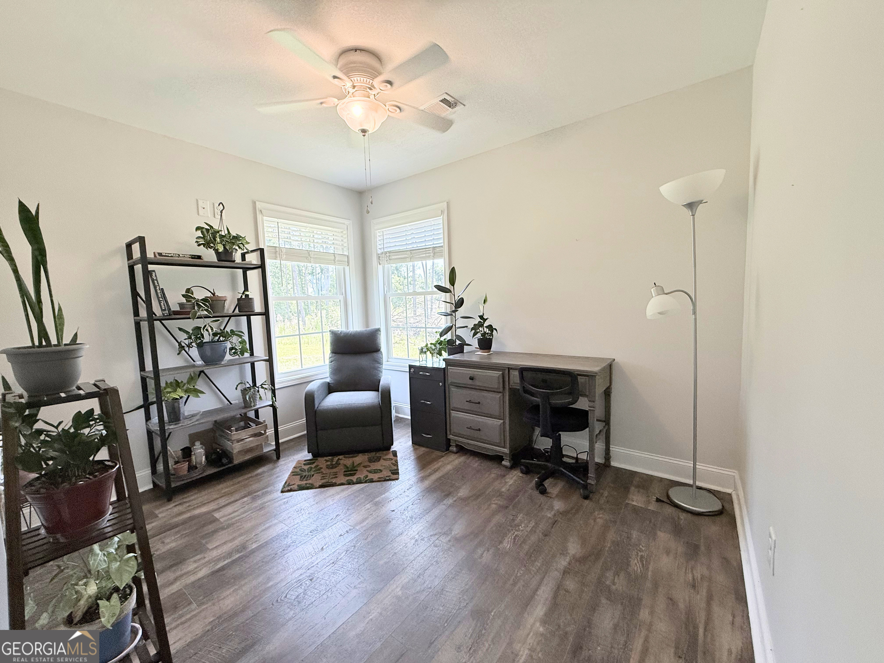 365 Quail Lane Alston, GA 30473 - Photo 6 of 9 a view of a workspace with furniture and a window