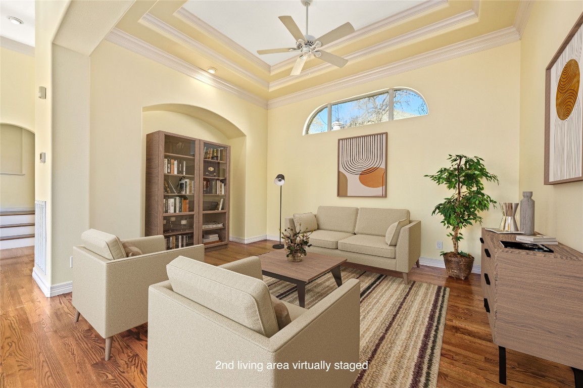 5903 Cane Pace Austin, TX 78746 - Photo 1 of 34 a living room with furniture and a chandelier