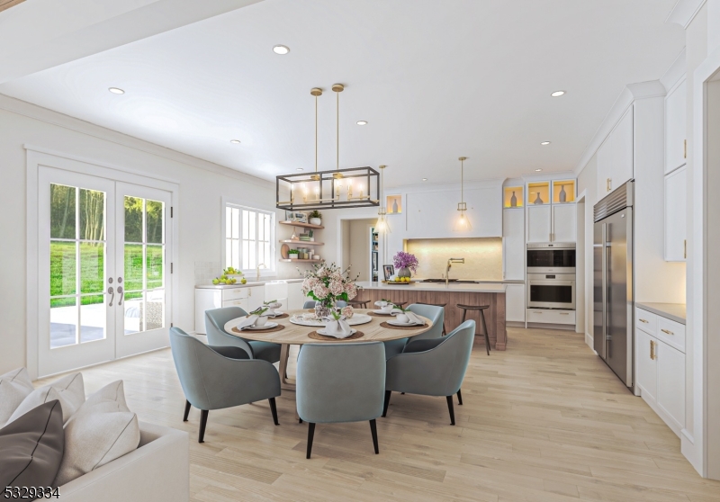 18 Deer Path Short Hills, NJ 07078 - Photo 5 of 14 a dining room with stainless steel appliances kitchen island granite countertop a sink a stove a dining table and chairs