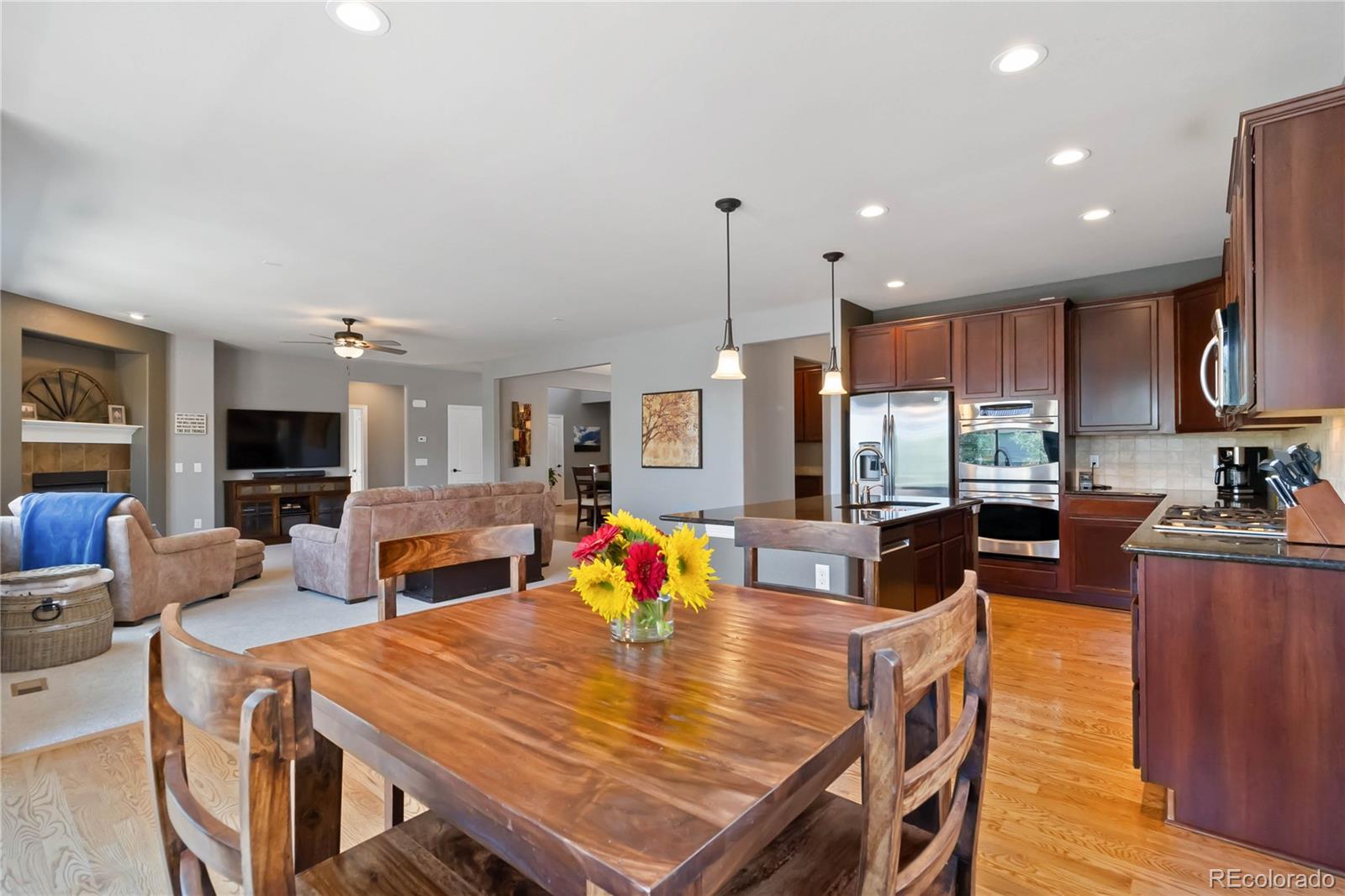 3034 Mashie Circle Castle Rock, CO 80109 - Photo 11 of 50 a view of a dining room with furniture