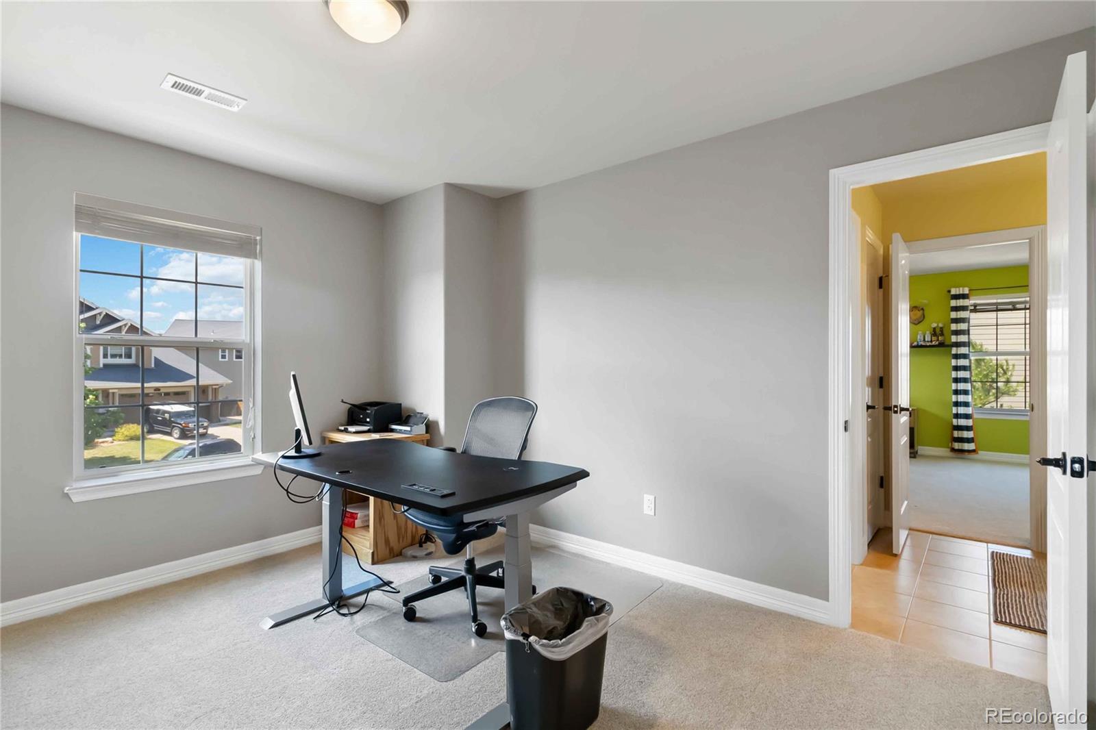 3034 Mashie Circle Castle Rock, CO 80109 - Photo 31 of 50 a work room with furniture and windows