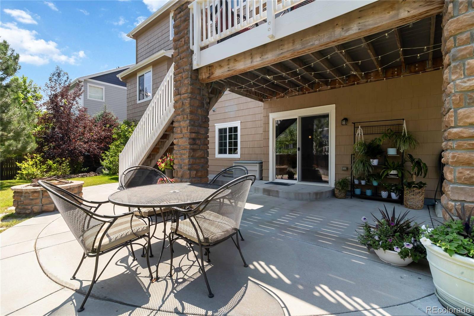 3034 Mashie Circle Castle Rock, CO 80109 - Photo 40 of 50 a view of a house with backyard and sitting area