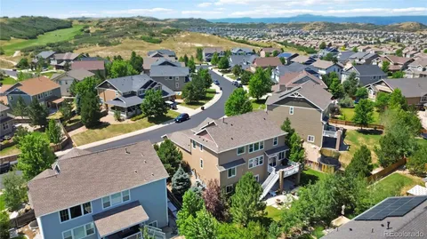 an aerial view of residential house with outdoor space