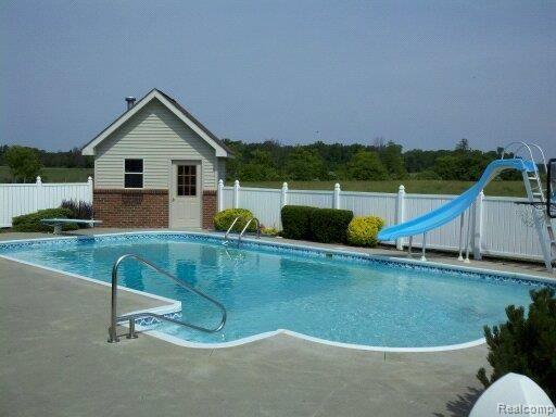 5040 Walker Road North Street, MI 48049 - Photo 16 of 18 5040WalkerRdpoolandpoolhouse