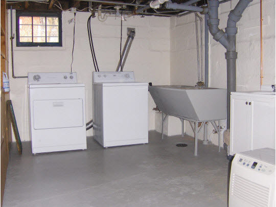 520 Brooke Road Rockford, IL 61109 - Photo 8 of 9 a view of cabinets and washer dryer