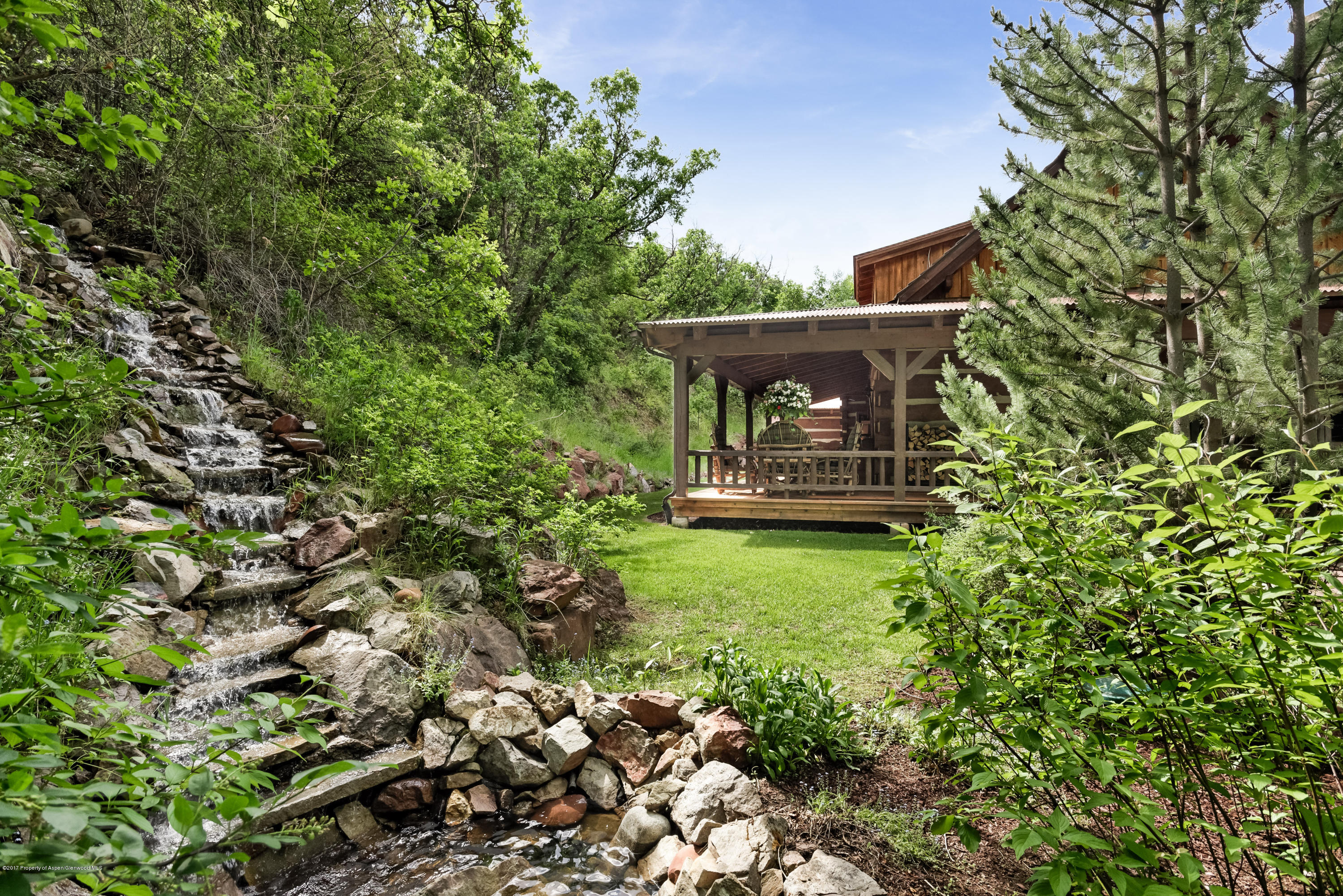 39 Altamira Ranch Road, Unit CABIN 39 Basalt, CO 81621 - Photo 17 of 23 a view of a house with a backyard