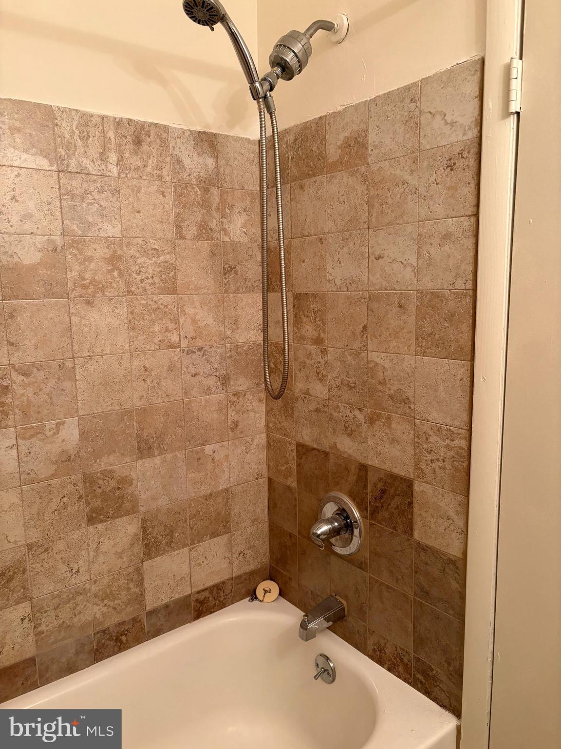 261 Ridgeway Terrace Philadelphia, PA 19116 - Photo 14 of 14 a bathroom with a bathtub and shower