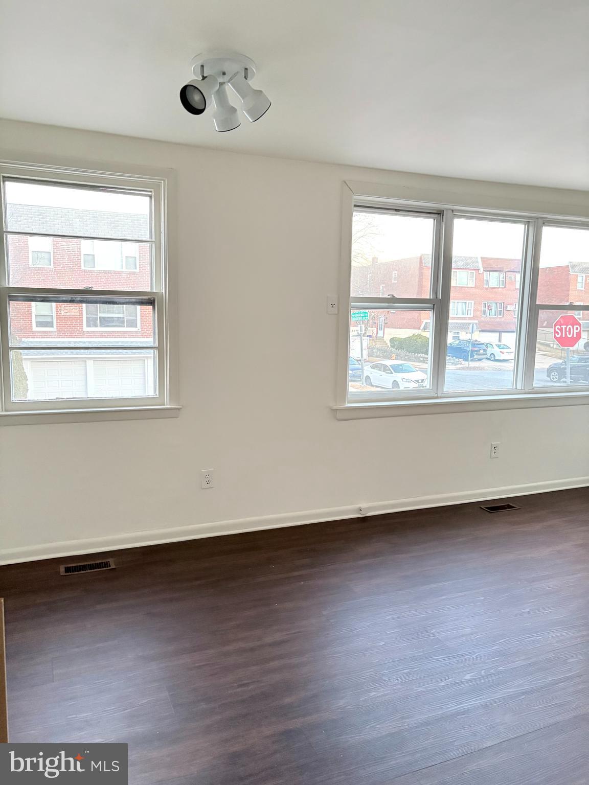261 Ridgeway Terrace Philadelphia, PA 19116 - Photo 7 of 14 an empty room with wooden floor and windows