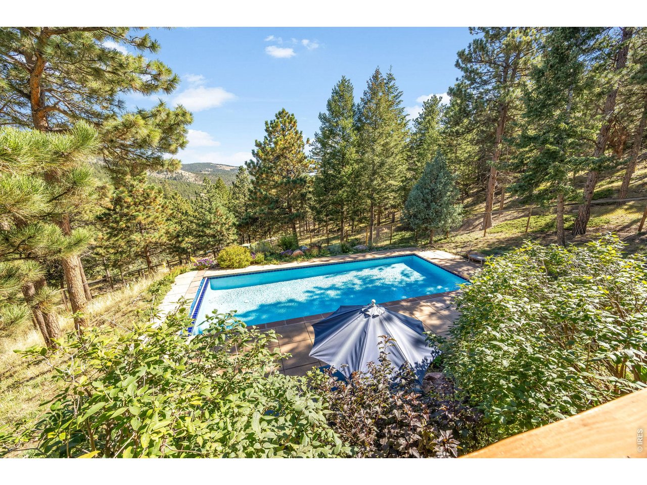 191 Alaska Road Boulder, CO 80302 - Photo 17 of 41 view of saltwater pool from upper deck