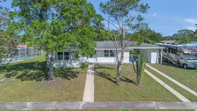 front view of house with a yard