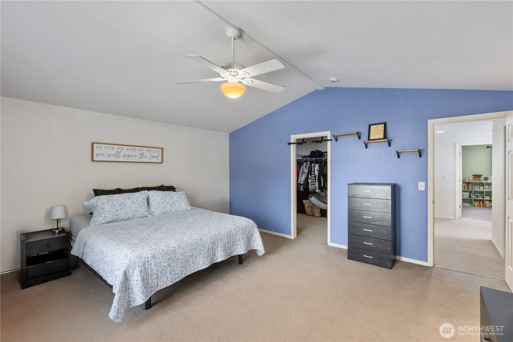 8305 Sweetbrier Loop Southeast Olympia, WA 98513 - Photo 31 of 40 a bedroom with a bed and a chandelier