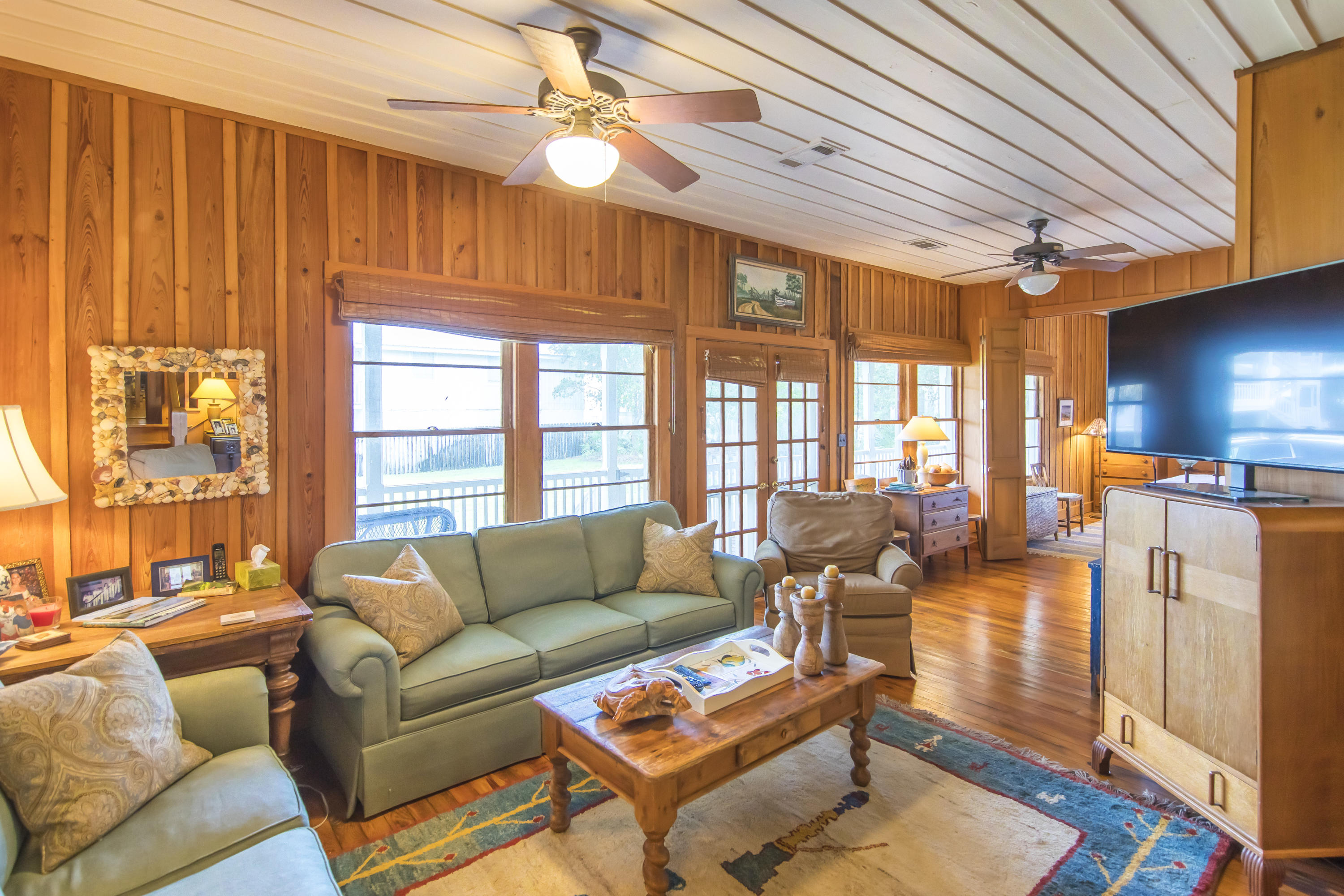 490 Defuniak Street Santa Rosa Beach, FL 32459 - Photo 18 of 46 a living room with furniture and a large window