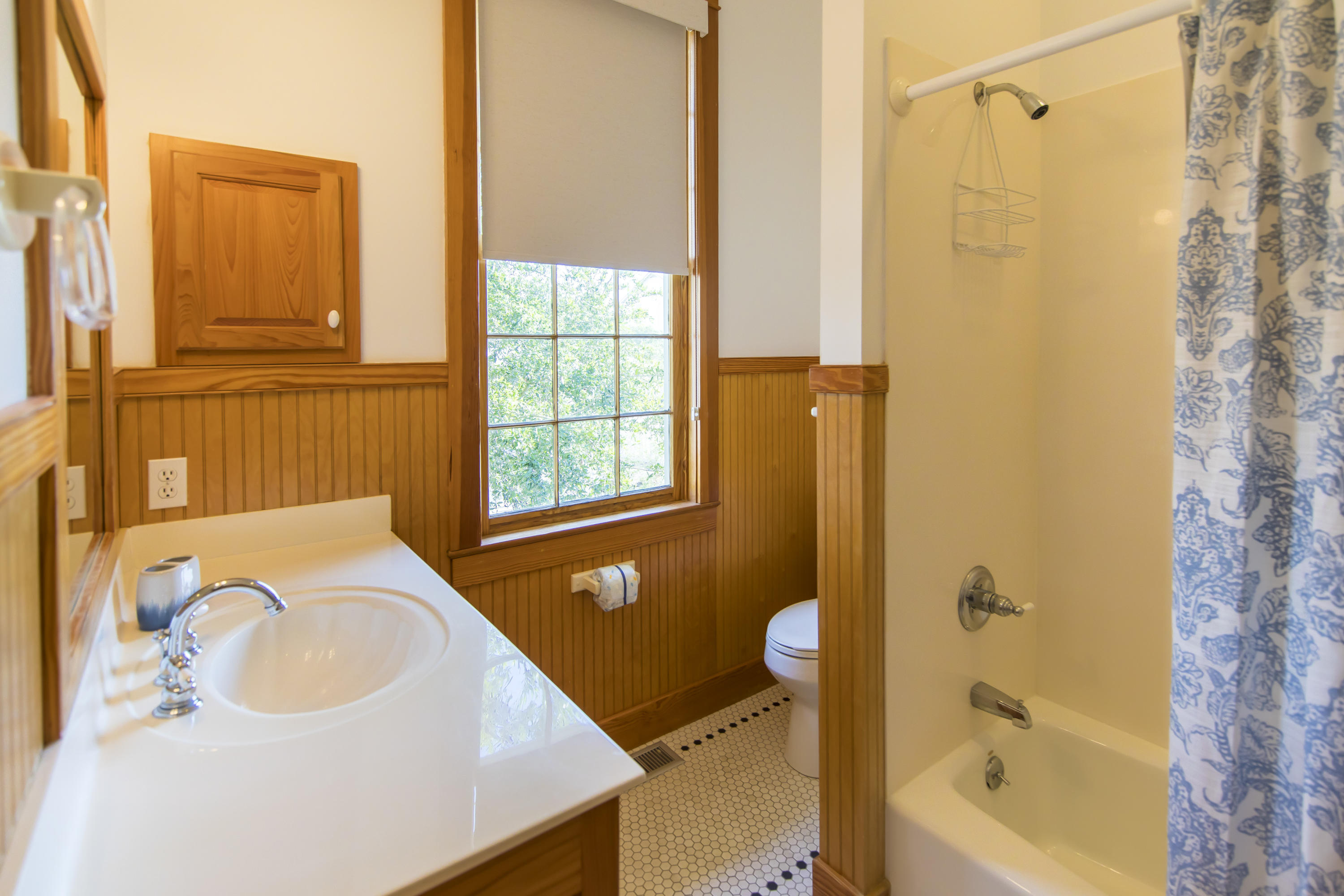 490 Defuniak Street Santa Rosa Beach, FL 32459 - Photo 34 of 46 a bathroom with a shower curtain and a sink