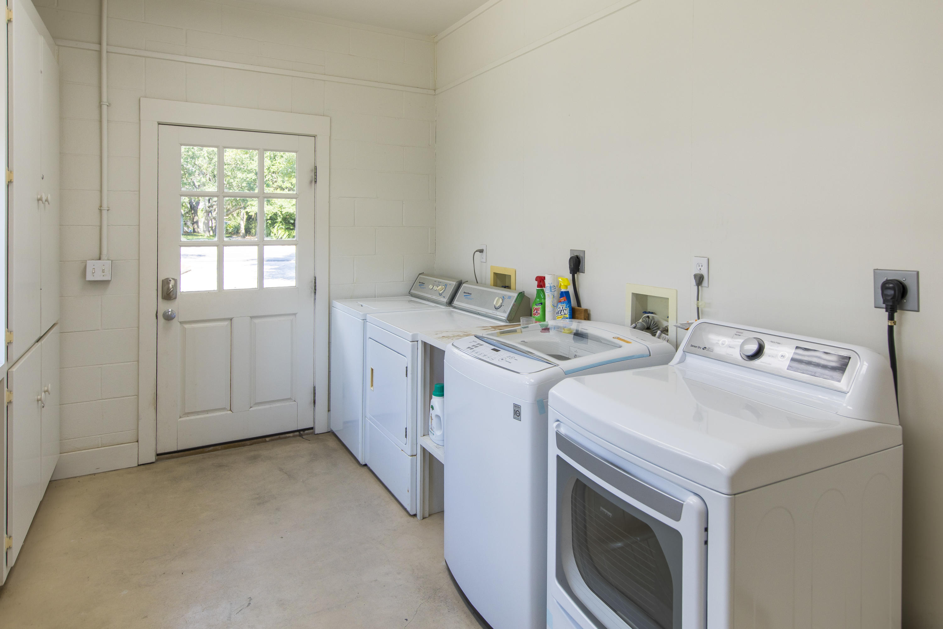 490 Defuniak Street Santa Rosa Beach, FL 32459 - Photo 41 of 46 a utility room with dryer and washer