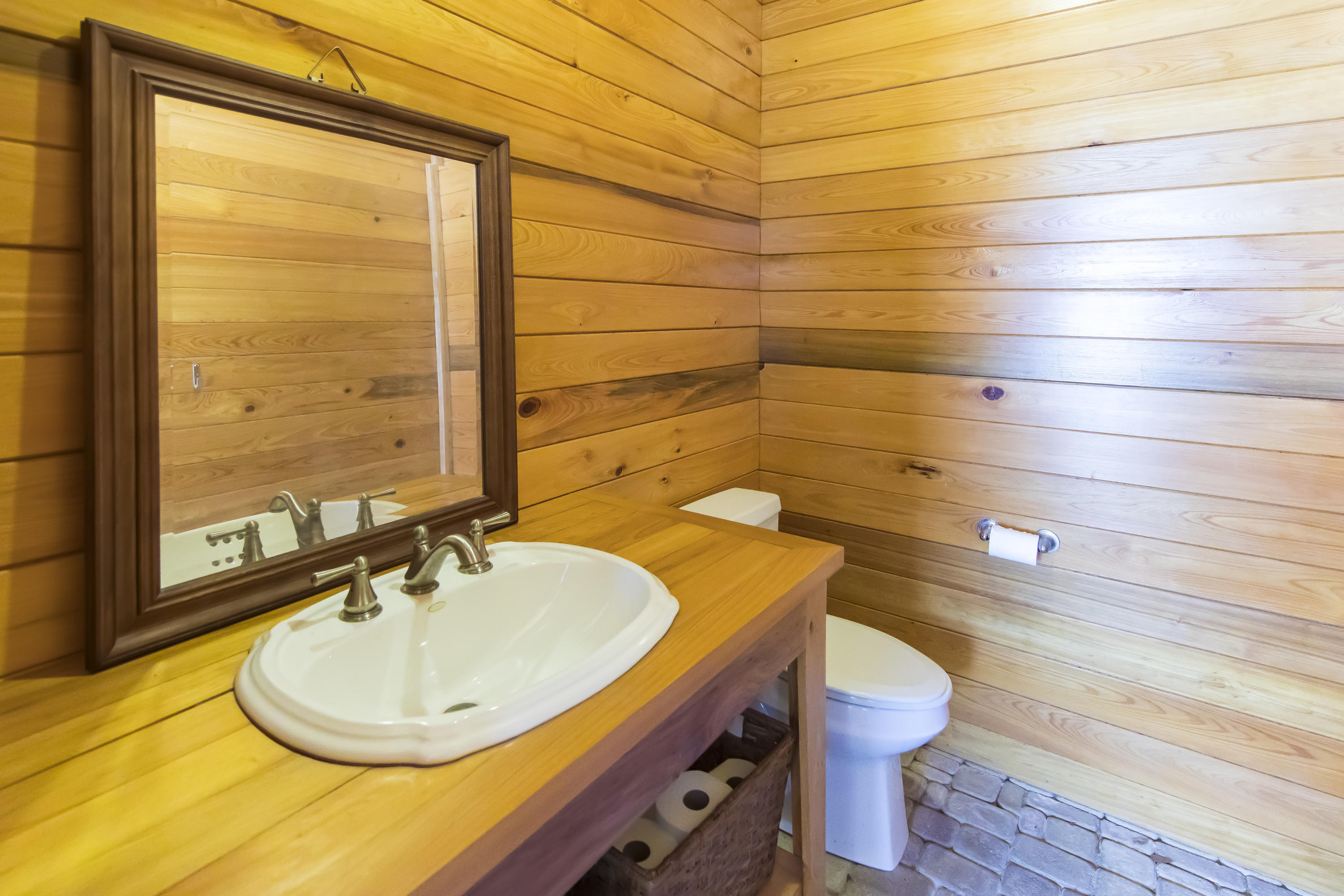 490 Defuniak Street Santa Rosa Beach, FL 32459 - Photo 44 of 46 a bathroom with a sink and a toilet