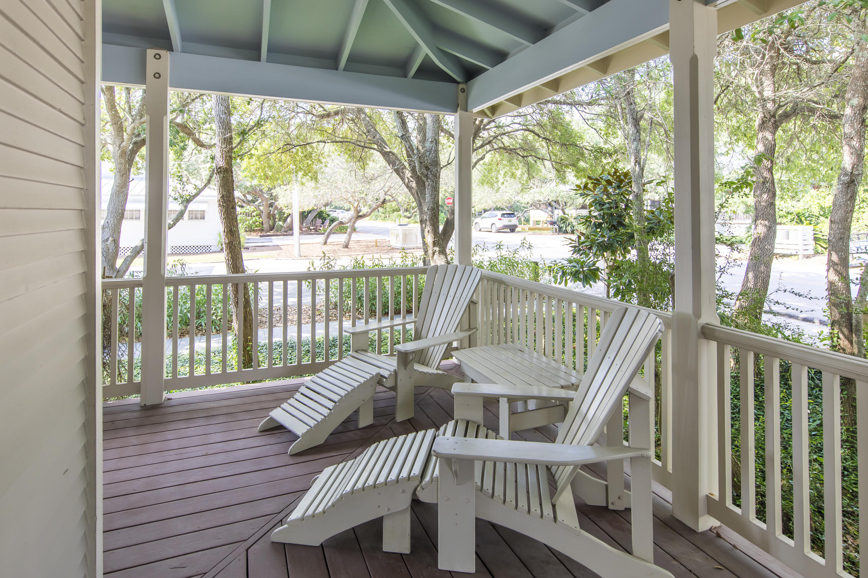 490 Defuniak Street Santa Rosa Beach, FL 32459 - Photo 6 of 46 a view of a deck with wooden floor and outdoor seating