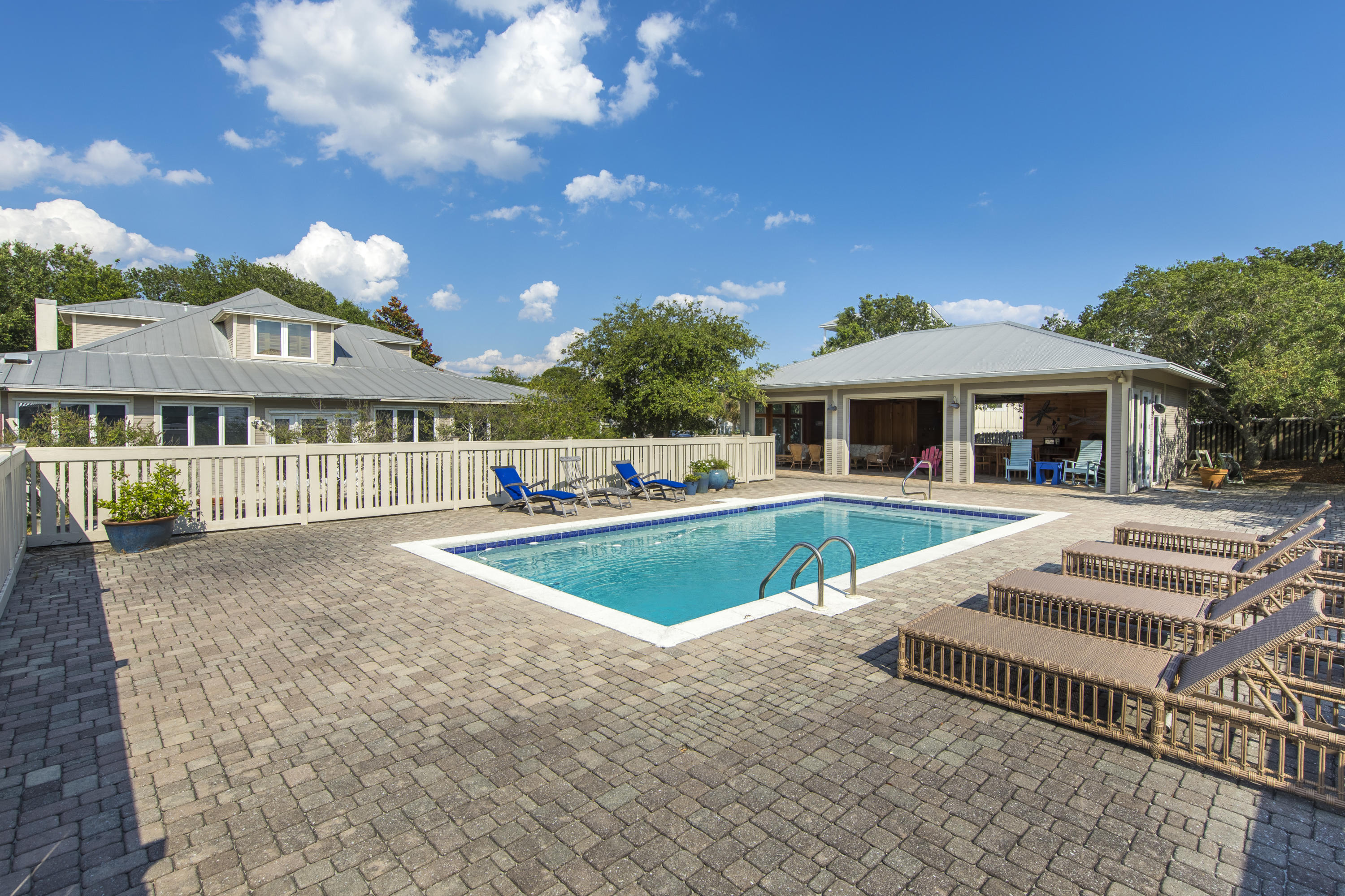 490 Defuniak Street Santa Rosa Beach, FL 32459 - Photo 7 of 46 a view of a house with a yard porch and furniture
