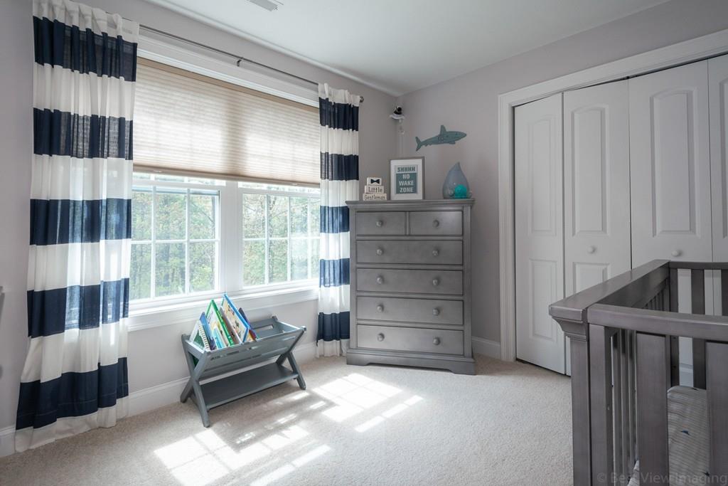 252 West Berlin Road Bolton, MA 01740 - Photo 23 of 34 a bedroom with a bed and a window