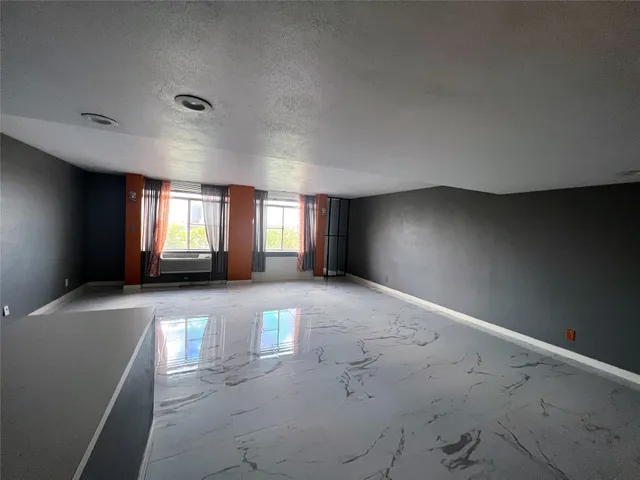 an empty room with windows