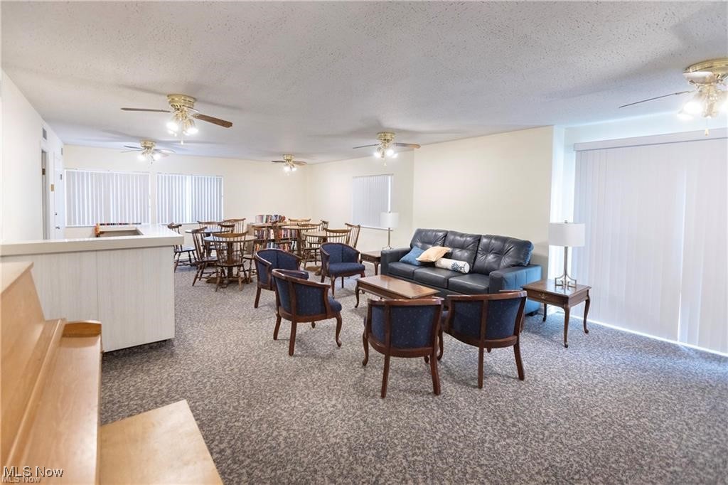 2089 Wooster Road, Unit C42 Rocky River, OH 44116 - Photo 29 of 43 Community room on first floor has nice access to the back of the building and swimming pool