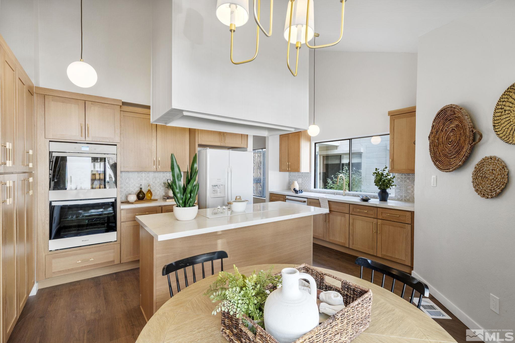 328 Lorraine Court Reno, NV 89509 - Photo 12 of 38 a large kitchen with a table and chairs