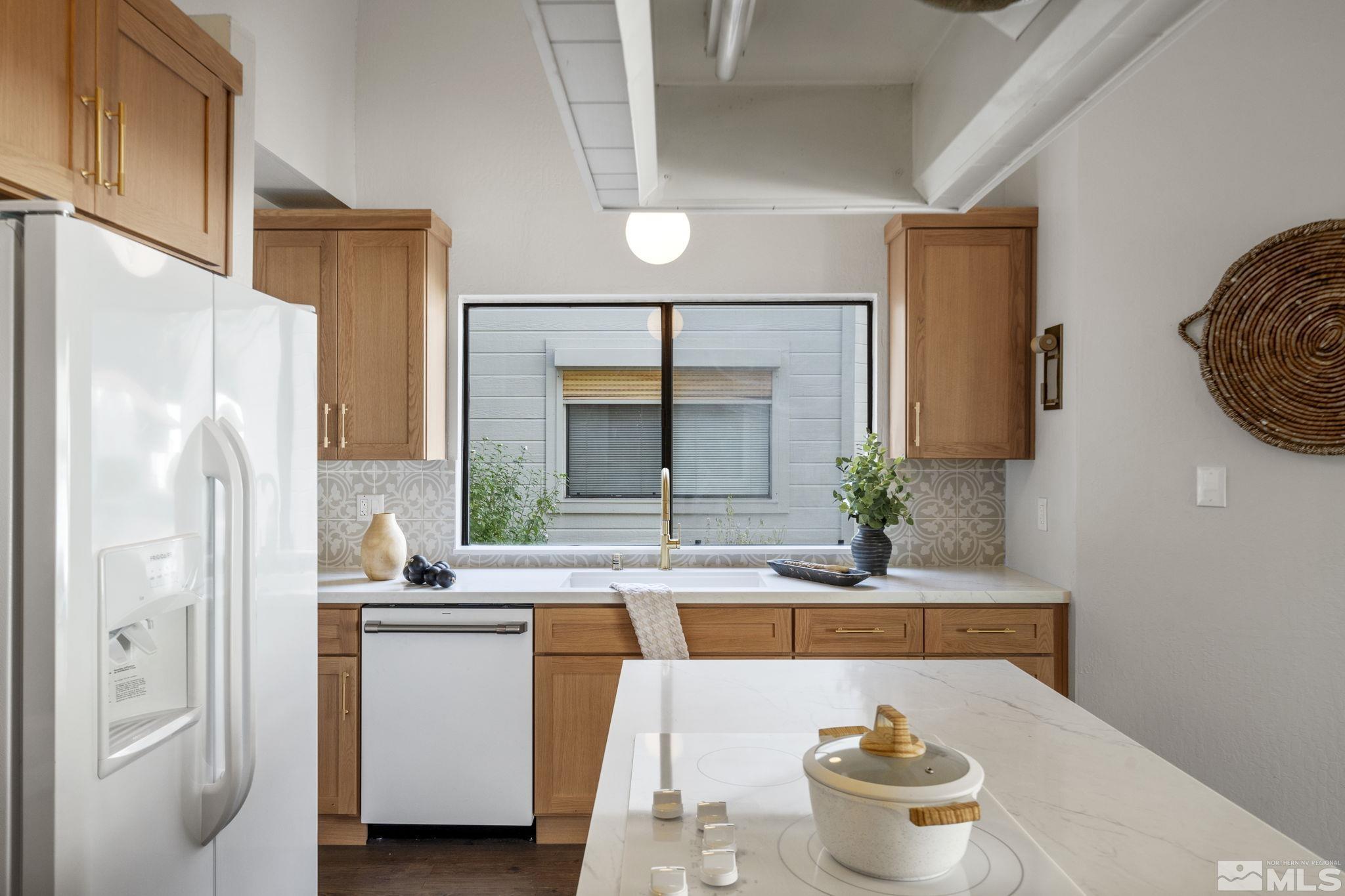 328 Lorraine Court Reno, NV 89509 - Photo 13 of 38 a living room with furniture and a window