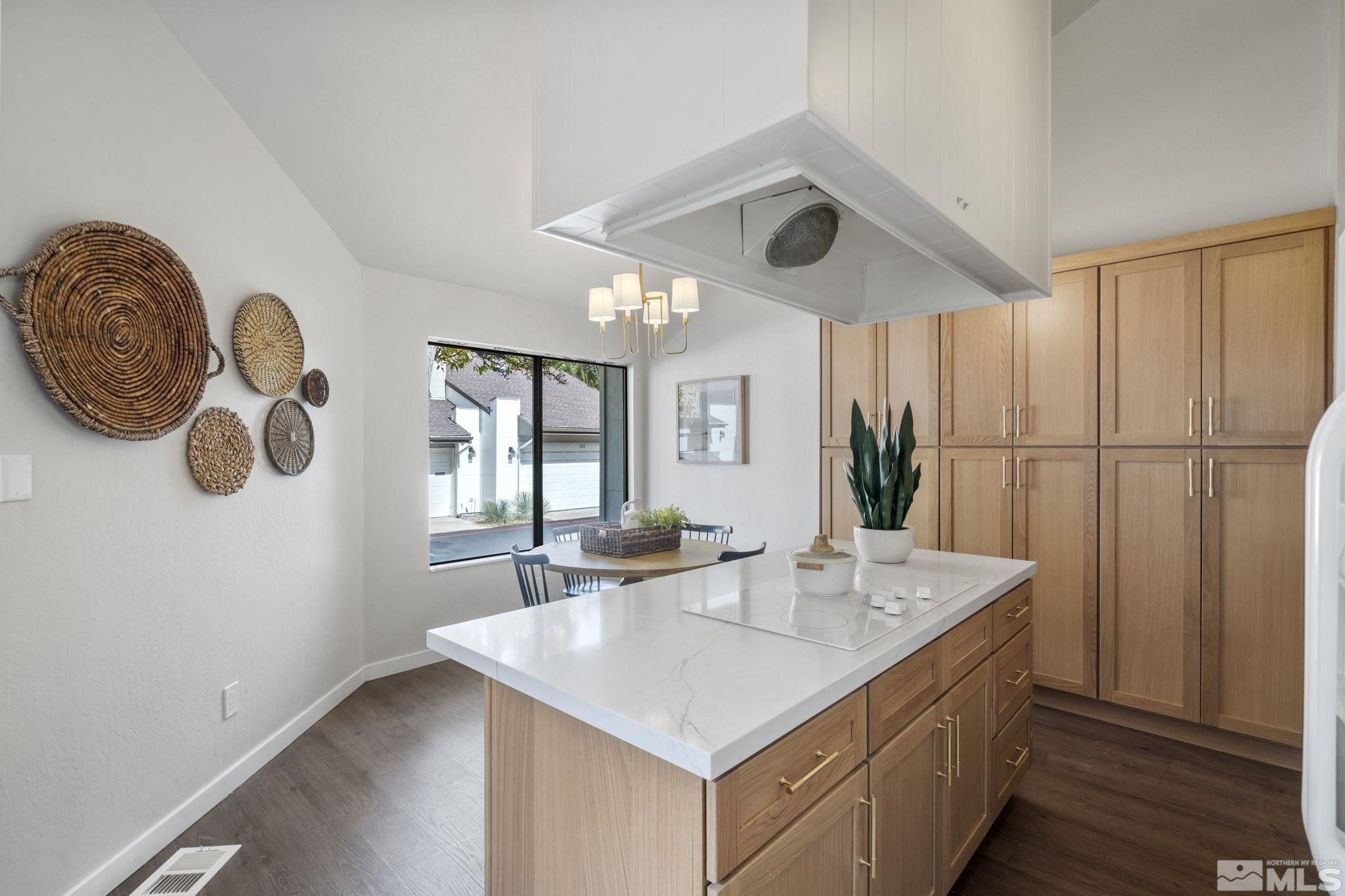 328 Lorraine Court Reno, NV 89509 - Photo 14 of 38 a kitchen with a sink and a refrigerator