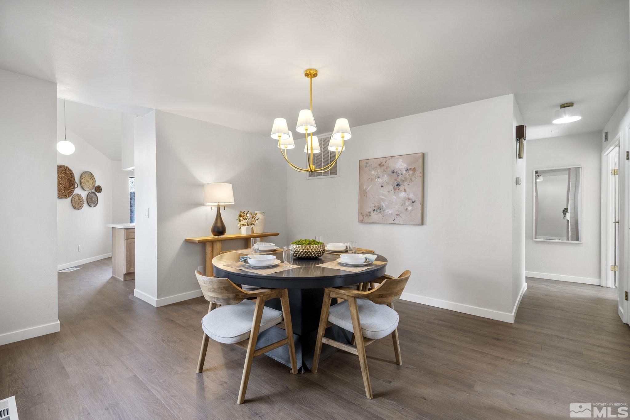 328 Lorraine Court Reno, NV 89509 - Photo 16 of 38 a view of a dining room with furniture and chandelier