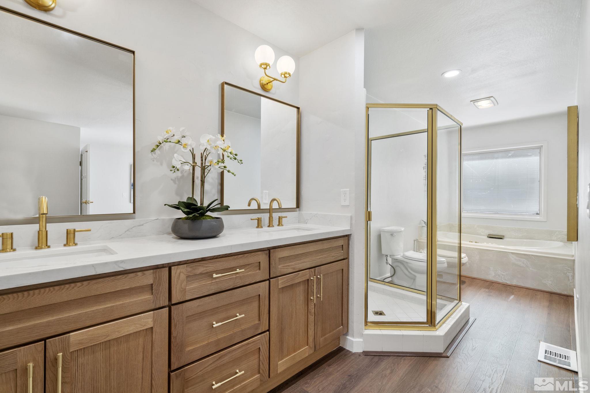 328 Lorraine Court Reno, NV 89509 - Photo 23 of 38 a bathroom with double vanity sink and a mirror