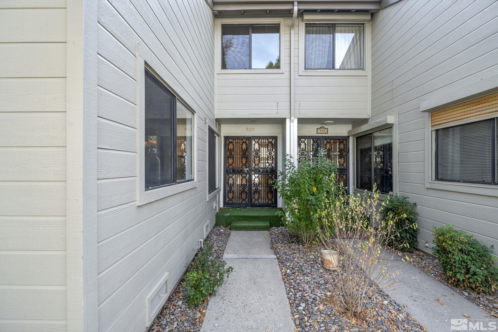 328 Lorraine Court Reno, NV 89509 - Photo 35 of 38 a view of a pathway of the house front of house