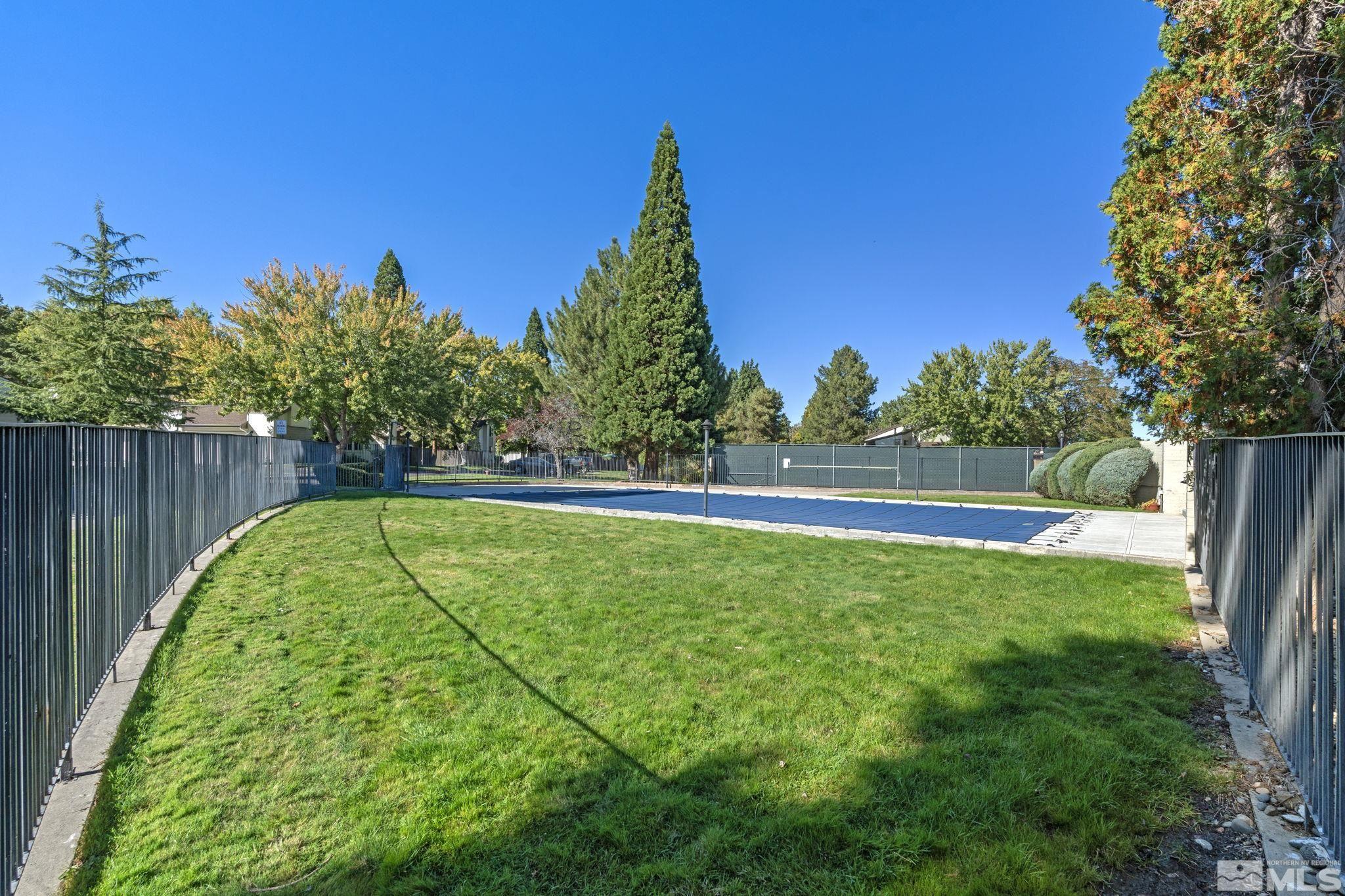 328 Lorraine Court Reno, NV 89509 - Photo 36 of 38 a view of swimming pool with a yard