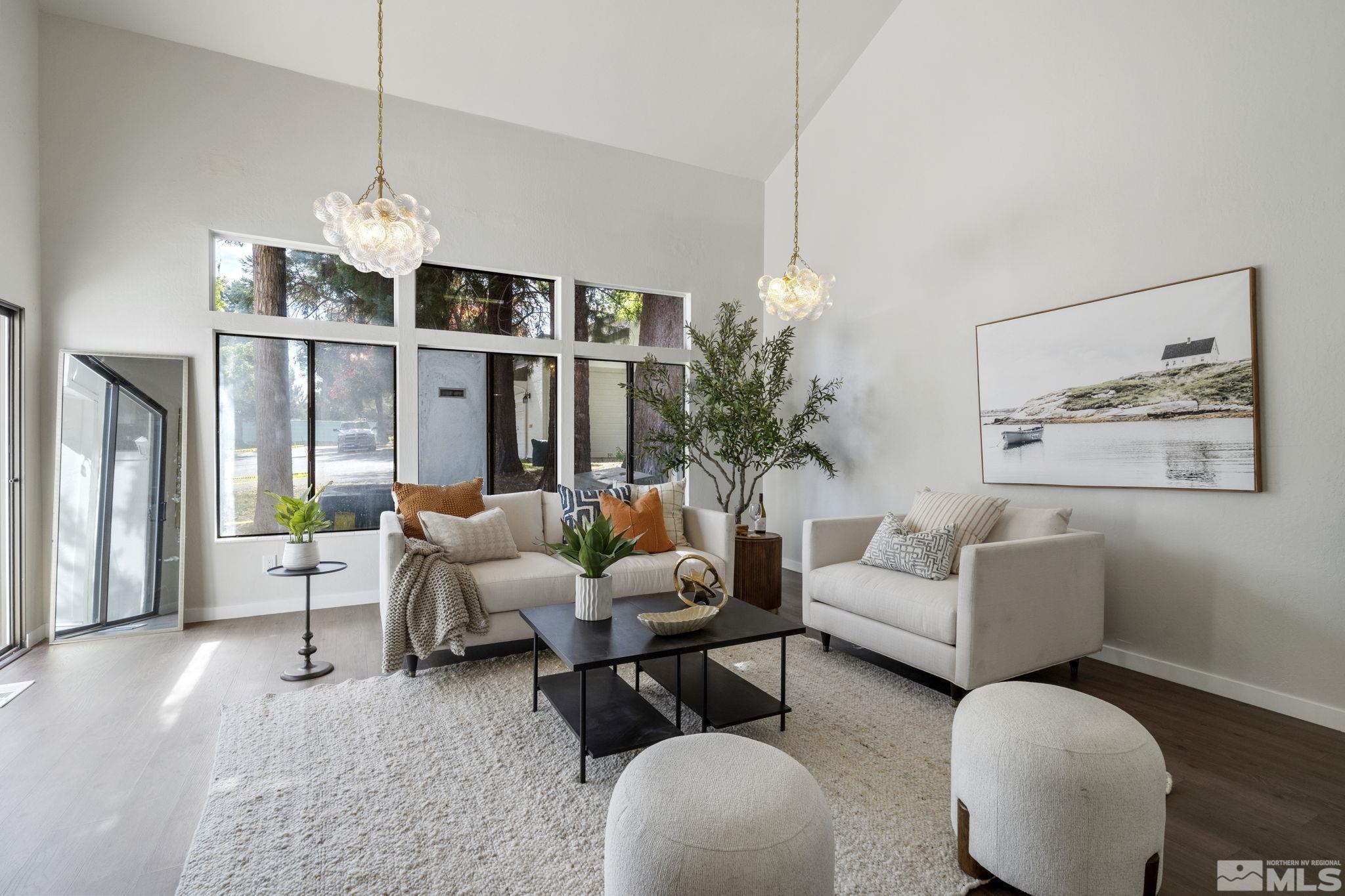328 Lorraine Court Reno, NV 89509 - Photo 7 of 38 a living room with furniture chandelier and a chandelier