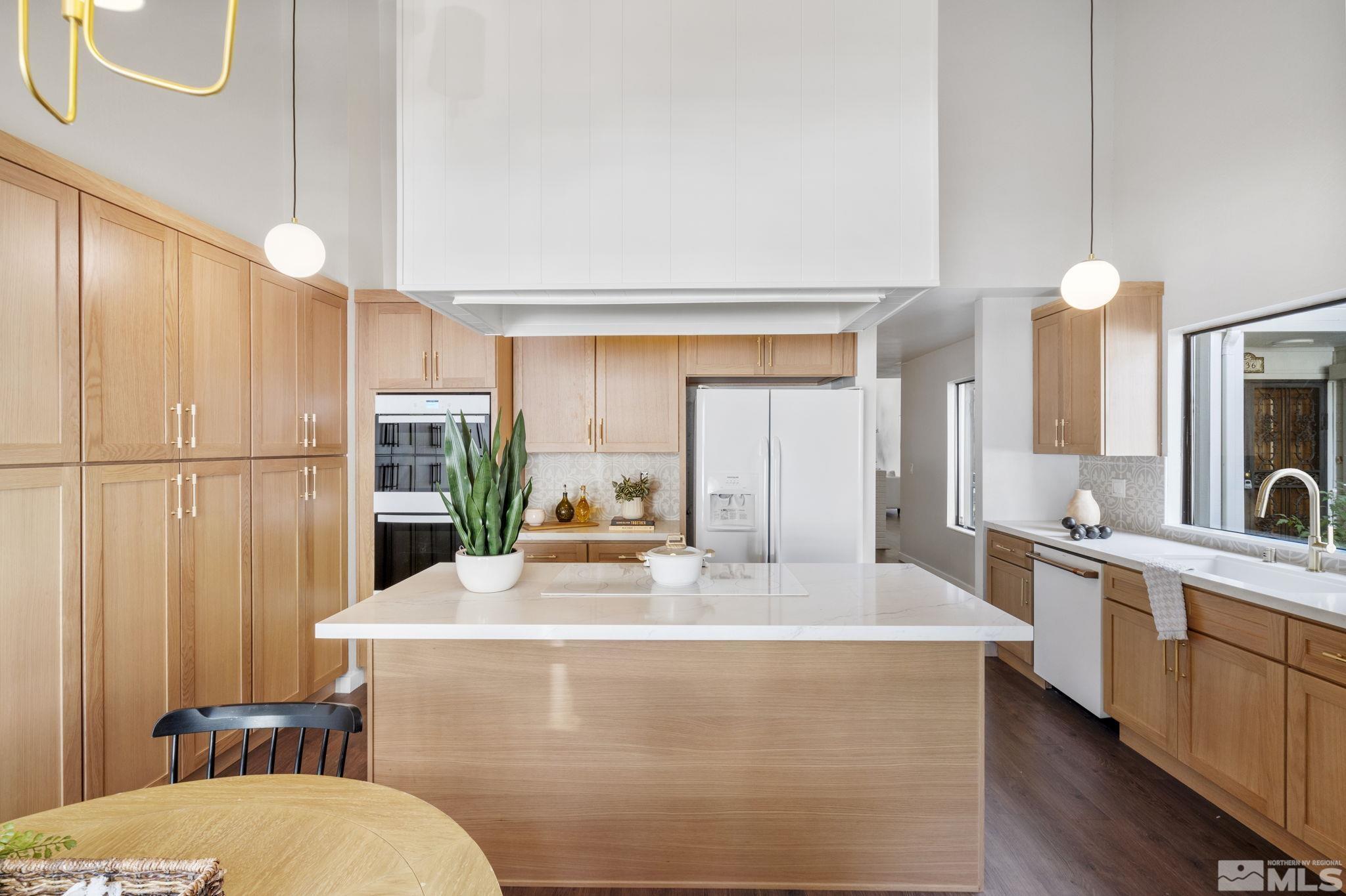 328 Lorraine Court Reno, NV 89509 - Photo 9 of 38 a living room with sink furniture and a large window