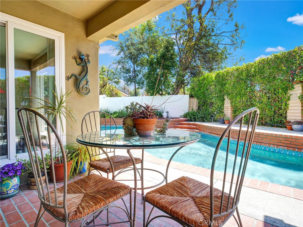 19238 Castlebay Lane Porter Ranch, CA 91326 - Photo 29 of 38 a view of a chairs and table in the patio