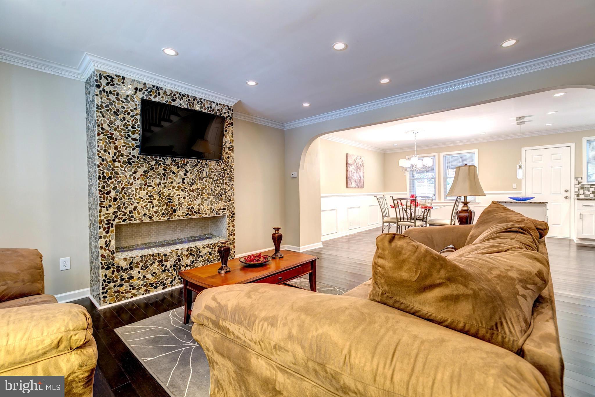 5446 Frederick Avenue Baltimore, MD 21229 - Photo 3 of 30 Living Room With Linear Fireplace