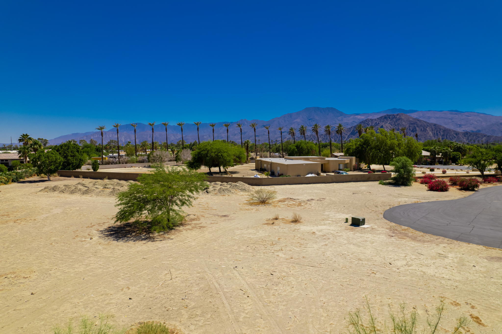 Lot 2 Mallet Court Indio, CA 92201 - Photo 16 of 18 a view of a lake with houses