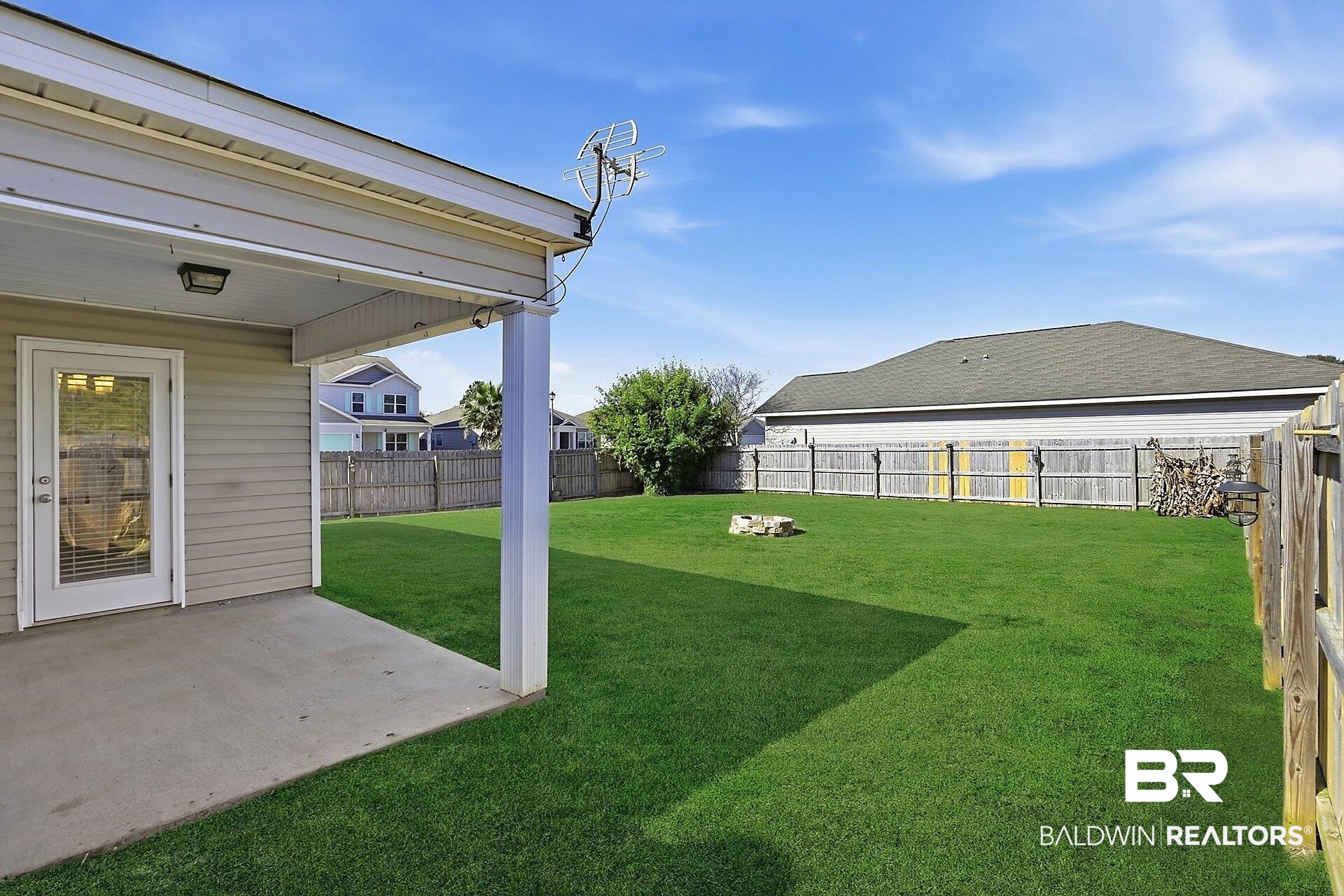 983 Summerton Drive Foley, AL 36535 - Photo 3 of 25 Fenced backyard featuring a patio area