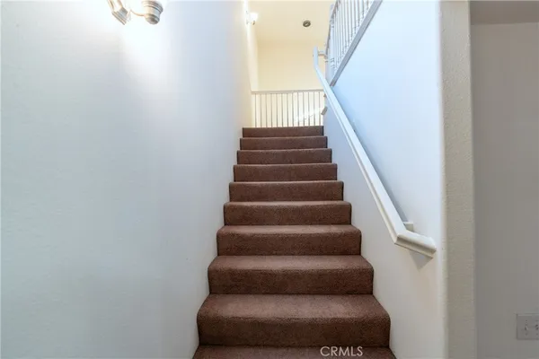 a view of a closet area with entryway