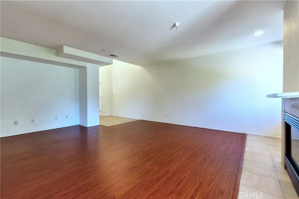 a view of a kitchen with a sink and a window